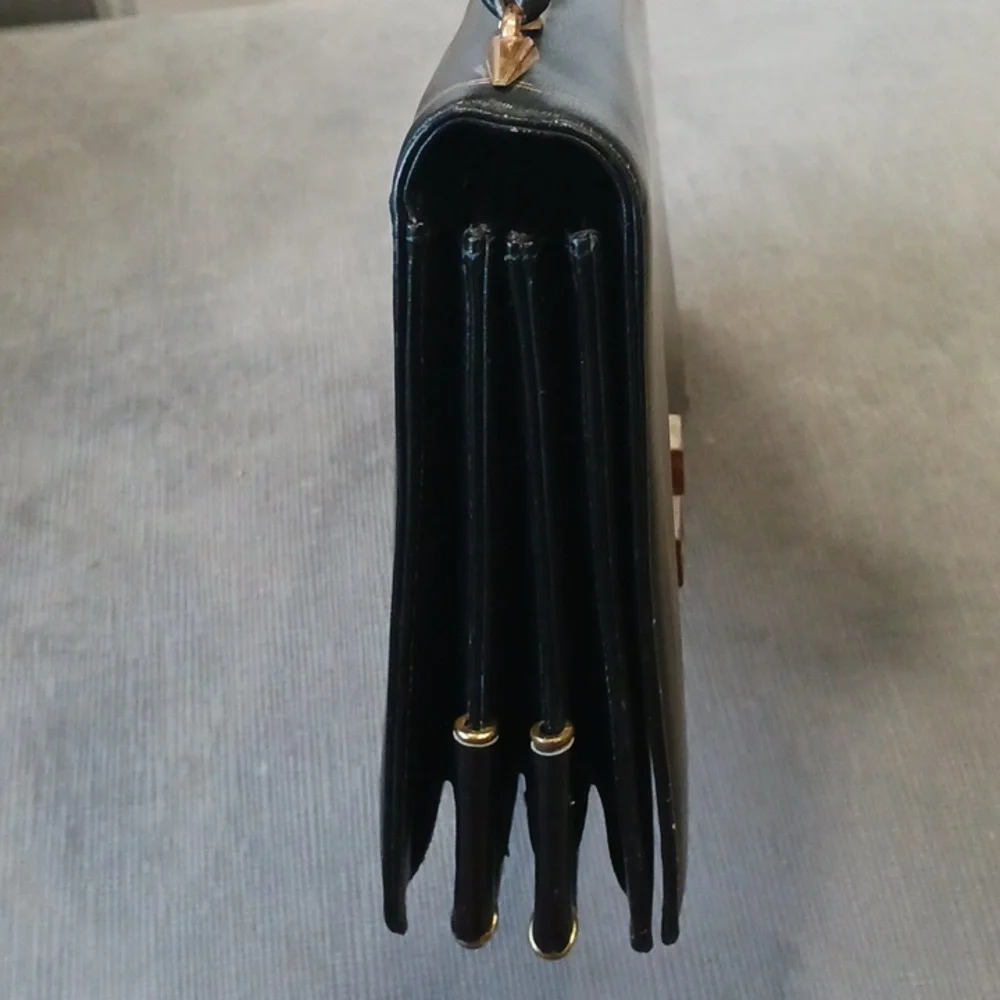 Black Shoulder Bag with Gold Accents